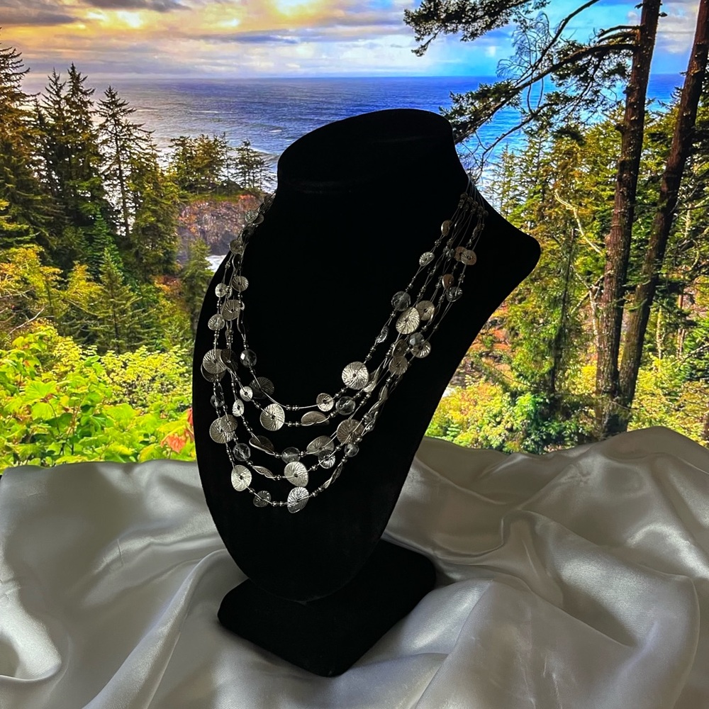 Silver tone and rhinestone multi strand necklace